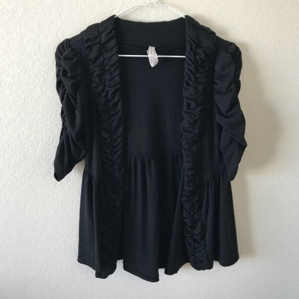 Discreet | Drop waist black cardigan with ruffles